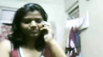 Desi girl from Mumbai chatting live with her boyfriend on webcam showing her mouth watering big breast.