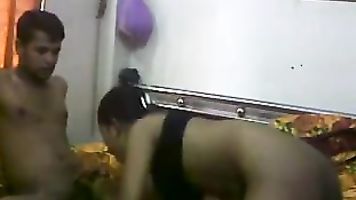 Sexy girl wearing clothes after sex with boyfriend
