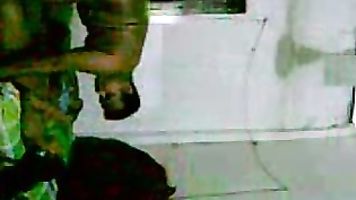 South indian aunty lying wearing chaddi squeezing her lovely tits while her guys gets on top to cum on her in this must watch MMS.