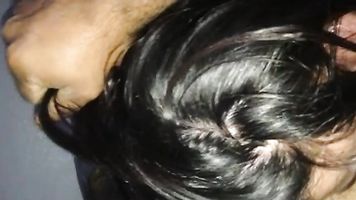 Indian desi wife sucking her clients cock giving him oral sex pleasure before lying on her back to get fucked missionary style with condom covered cock and big boobs fondled and slapped finally taking cum load on face in this must watch MMS.