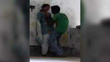 Patna, Bihar high school girl in coaching center roof after class with her boyfriend who passionately kissed her and pressing her juicy boob!.