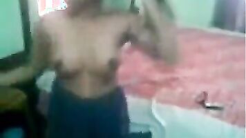 Fondling Indian girlfriend while she gets dressed.