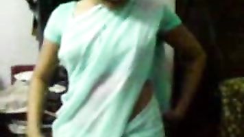 Horny Indian wife in saree striptease at home.