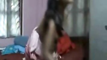 Indian GF talking on the phone and masturbating.