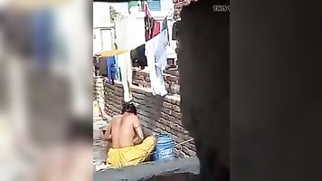 Aunty Bathing Topless in Terrace..