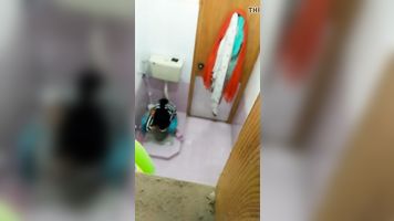My cousin getting pee in washroom