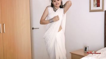 Jasmine lets you know she's here to tease you in her sexy traditional Indian sari.