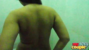 This dark-haired lovely hot Sonia in party wear stripped naked for shower with her husband Sunny.