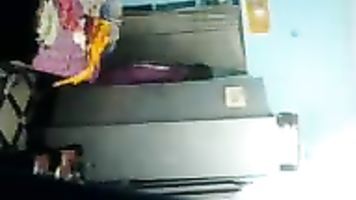 Raghava Telugu aunty changing her clothes in her room.